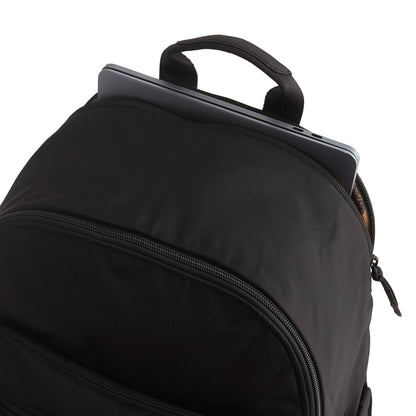 Black backpack with a laptop compartment on a white background