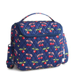 Blue quilted bag with cherry pattern on a white background